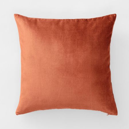 orange fur pillows