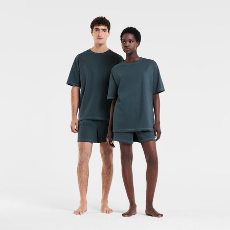 Model on left is 188cm and wearing a size L top and pant, Model on right is 175cm and is wearing a size S top and pant.