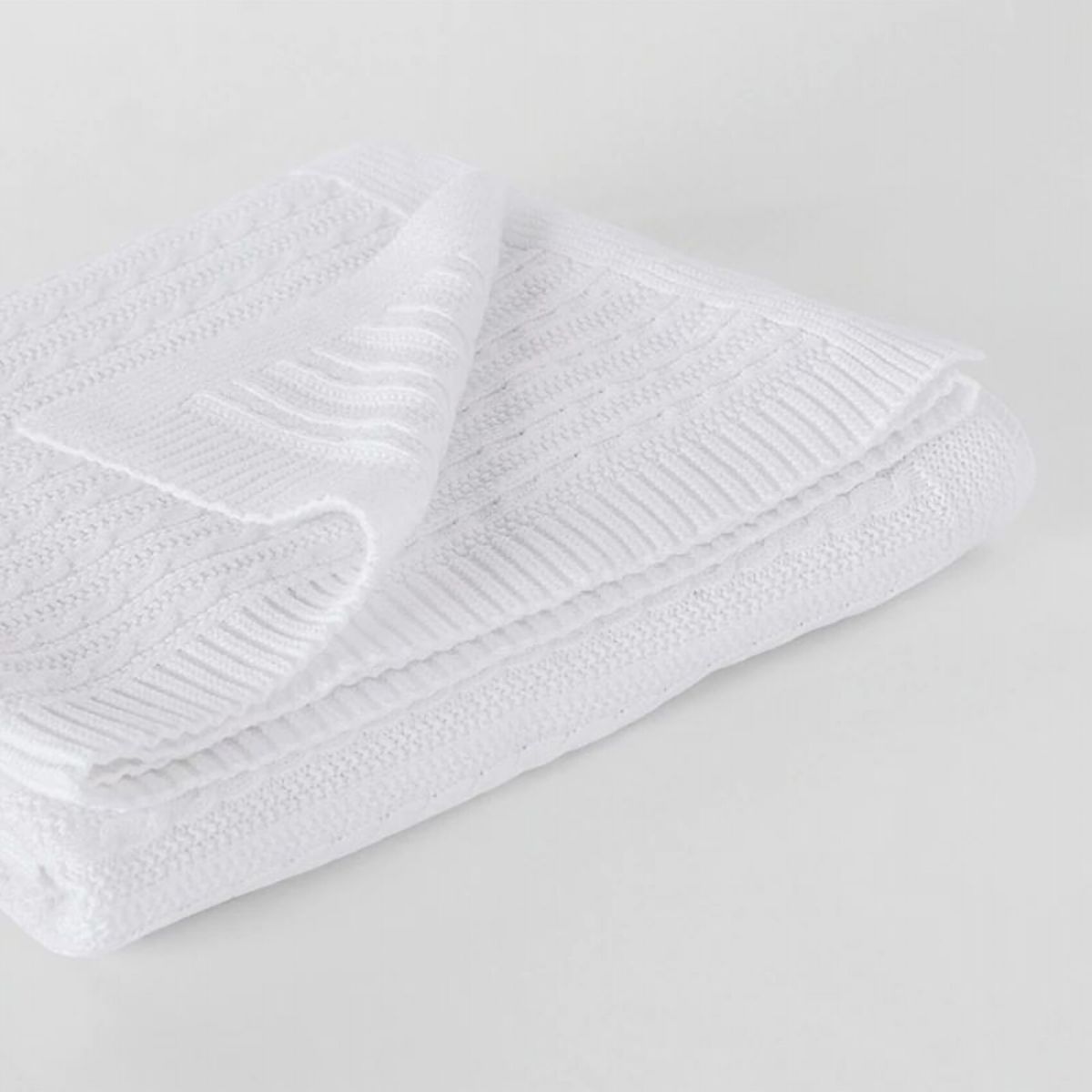 white cot blanket