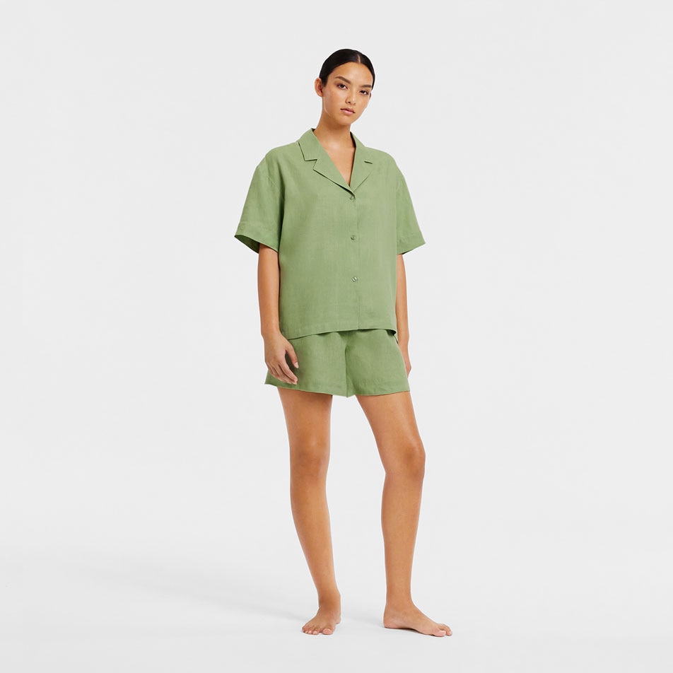 A model wearing a green Abbotson Linen loungewear set