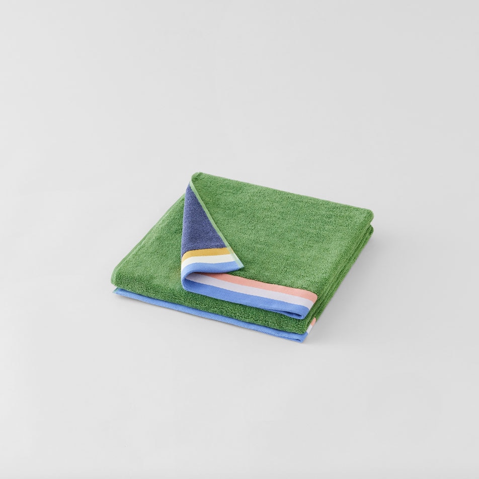 Flat lay photo of an Ambi Kids Towel in the colour snow pea