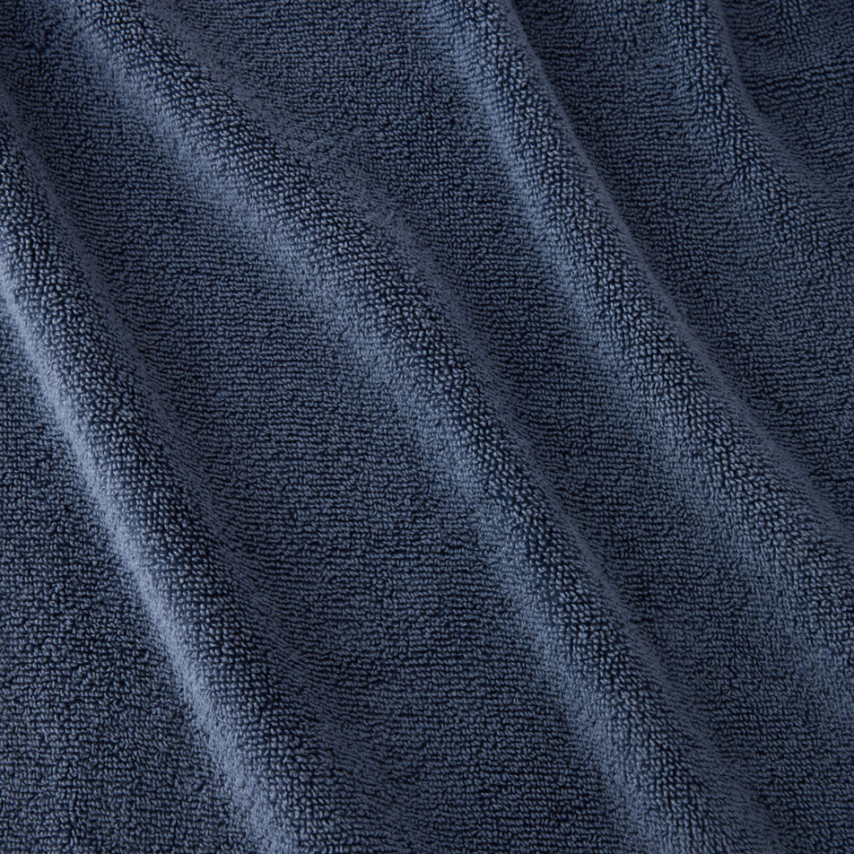 Close up image of navy blue cotton terry
