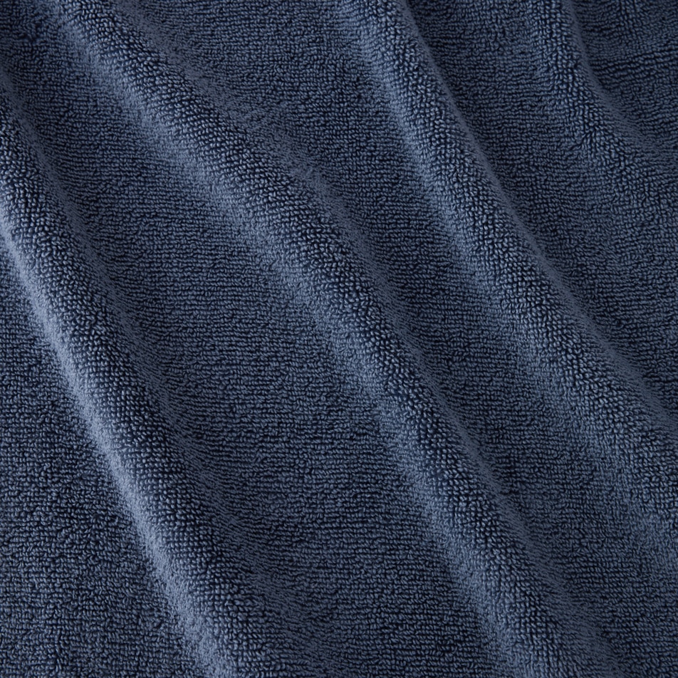 A close up image of navy blue Australian cotton terry