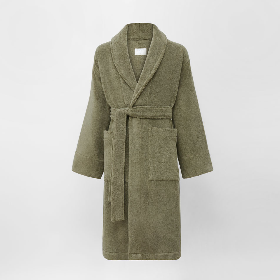 A flat lay image of an Aven bathrobe in the colour olive