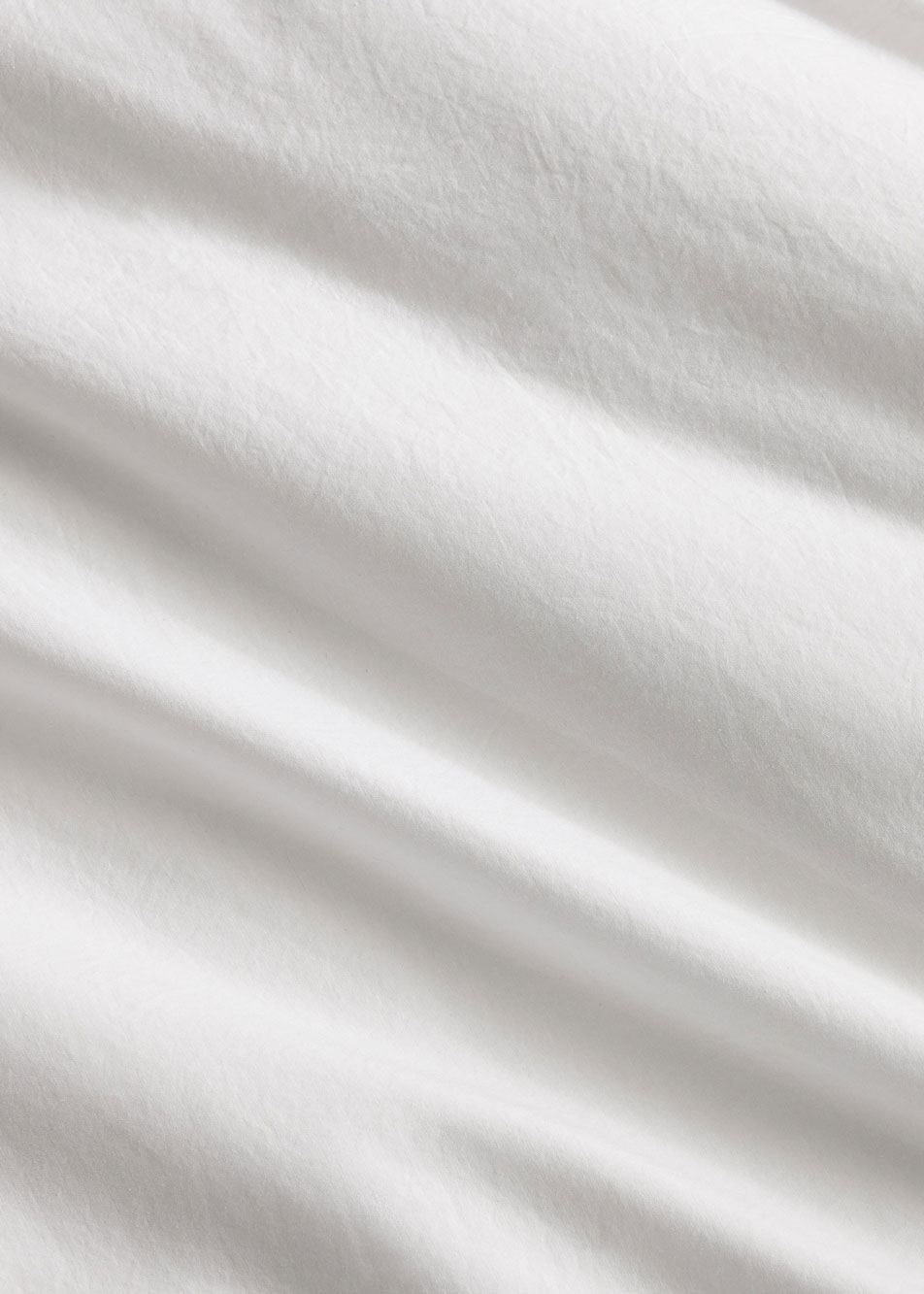 Close-up of Bayley Washed Percale sheets in white