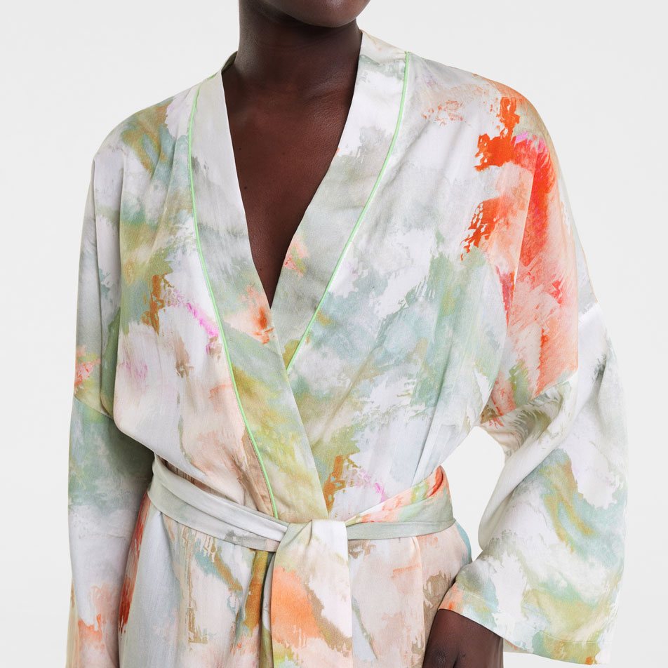 Close-up of a model wearing a printed TENCEL bathrobe