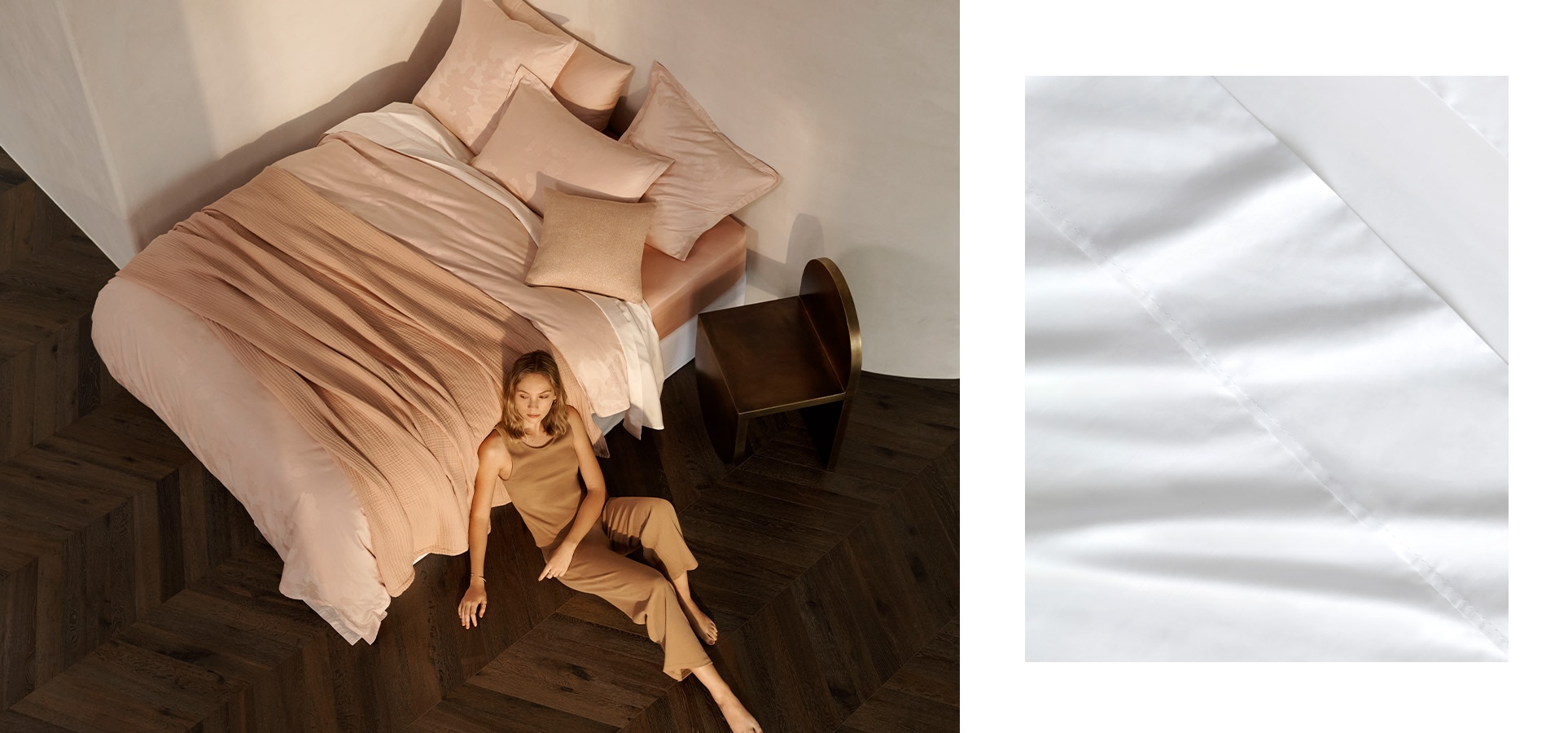 split image. left side, white model with blonde hair sits on wooden floor, back leaning against a pink bed layered with blanket and pillows. right side, a close up of a white cotton sateen sheet.