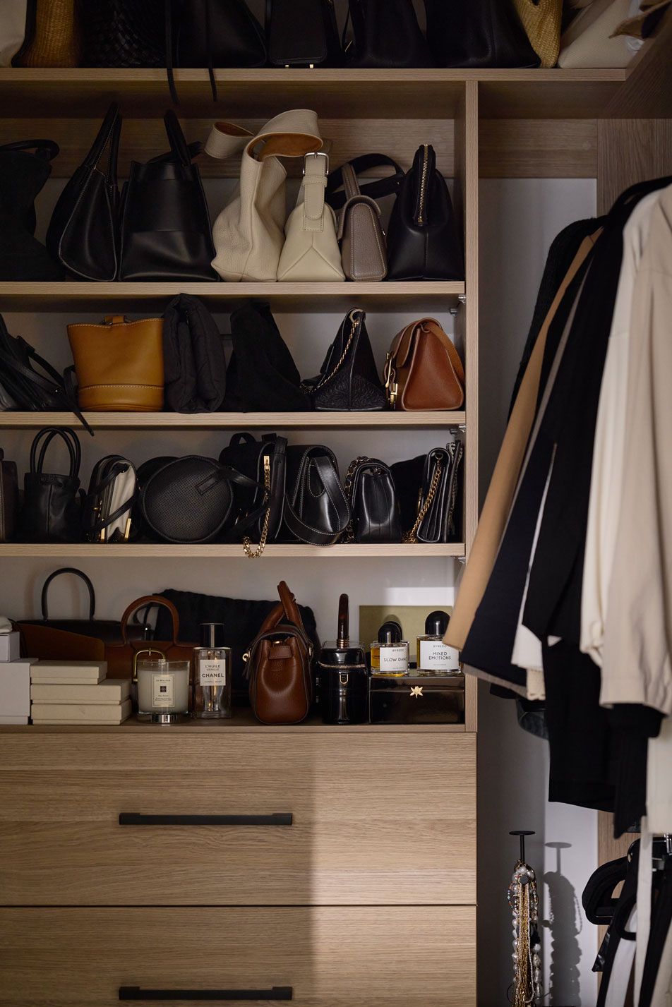 A side table in a children's bedroom. On top of the table is a vase and various toys.