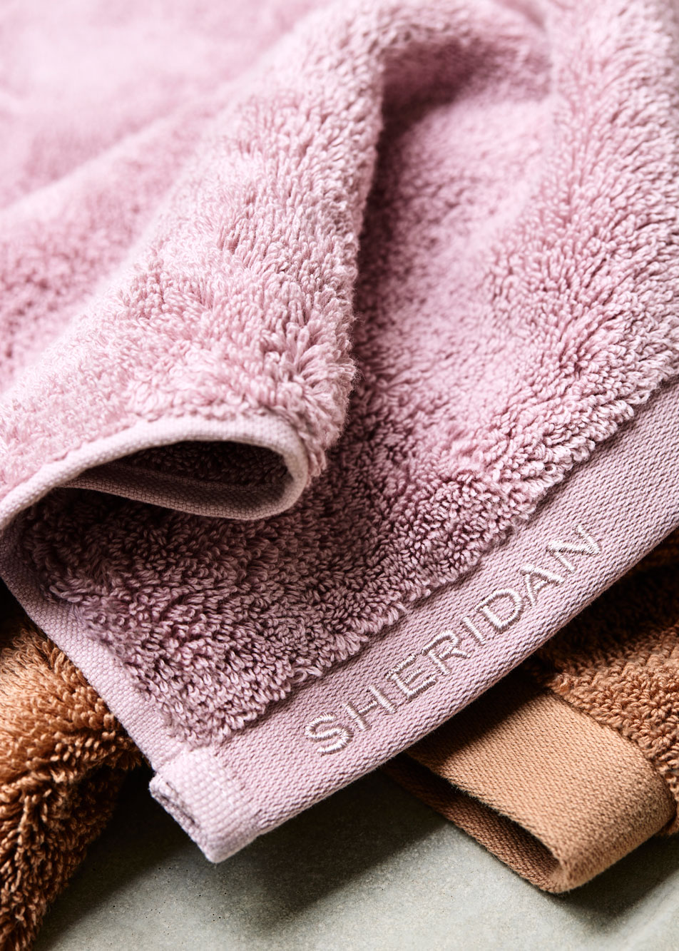 detail shot of pink and orange ultimate indulgence towels