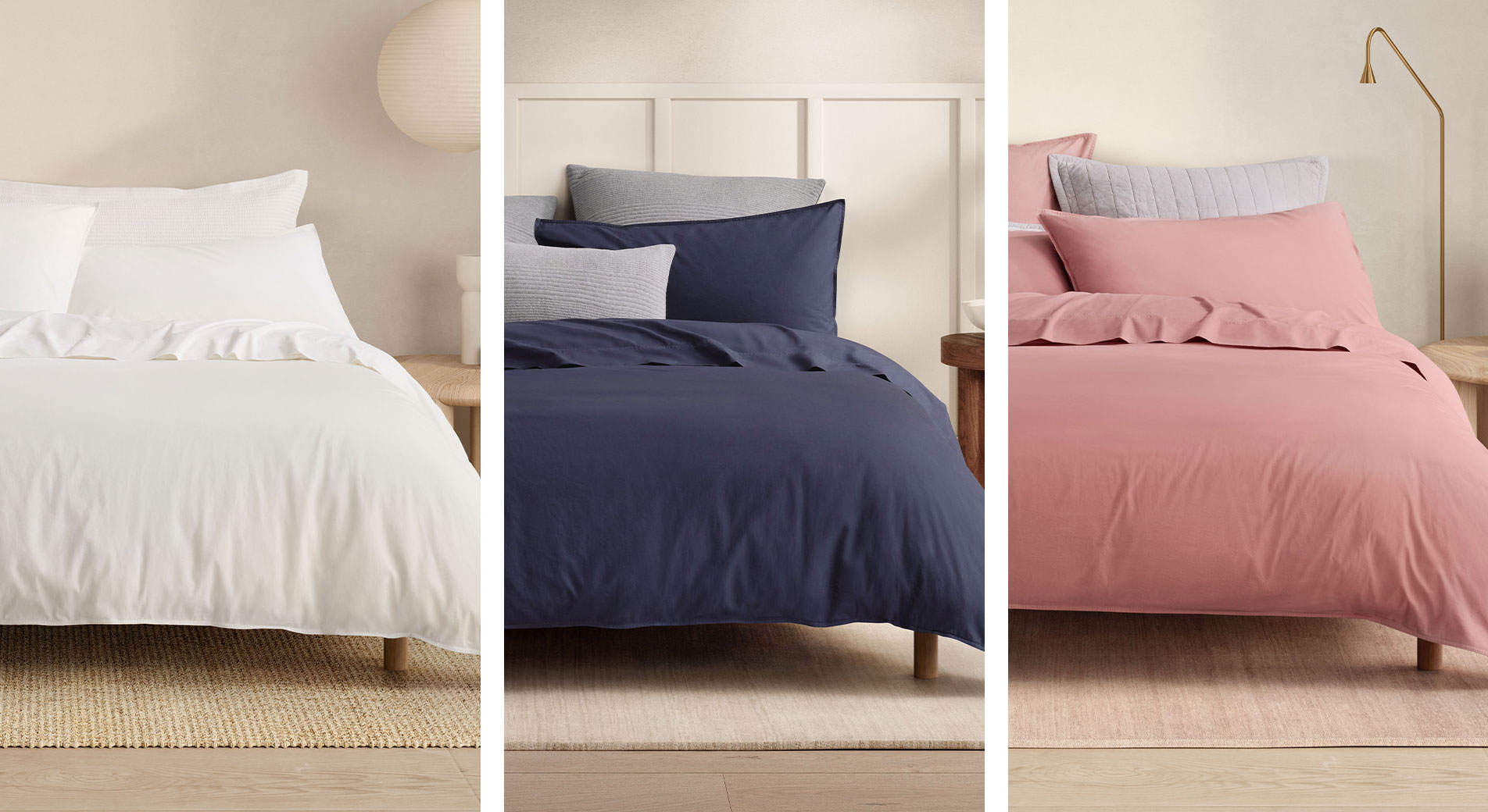 Three beds side-by-side, dressed in Bayley quilt cover sets in white, deep sea and rose